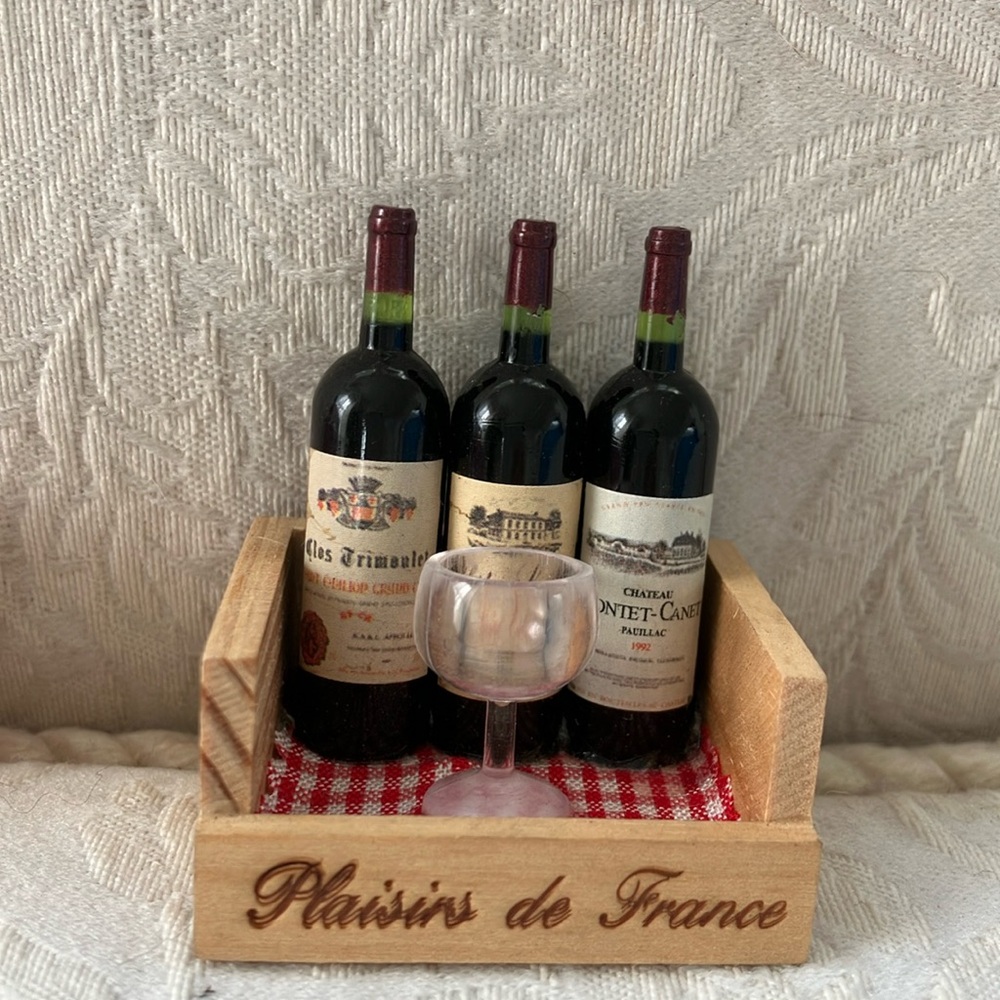 Adorable handmade French refrigerator magnet featuring three bottles of red wine